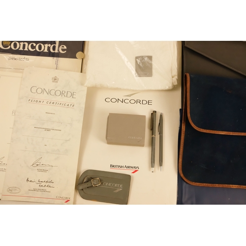 17 - A quantity of Concorde ephemera - including cufflinks, a silver picture frame, writing paper with en... 