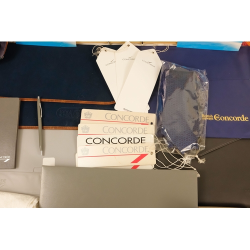 18 - A quantity of Concorde ephemera - including a clock, a silver picture frame, writing paper with enve... 