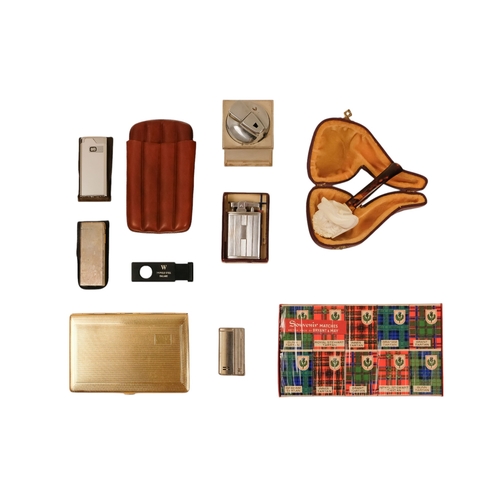 19 - A collection of smoking ephemera - including a meerschaum pipe, a tan leather cigar case, a cigarett... 