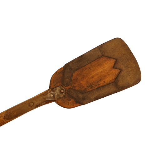 2 - A 19th century wooden spade - ash with metal fittings, 119cm.