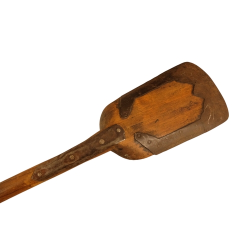 2 - A 19th century wooden spade - ash with metal fittings, 119cm.