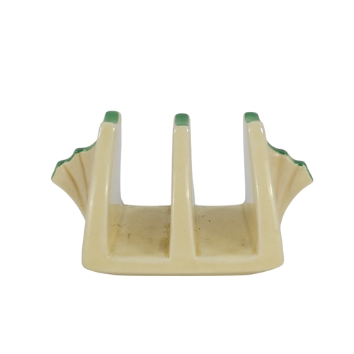 201 - A Clarice Cliff crocus pattern flower brick - painted in colours, printed facsimile signature mark t... 