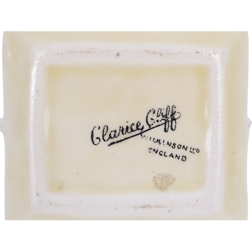 201 - A Clarice Cliff crocus pattern flower brick - painted in colours, printed facsimile signature mark t... 