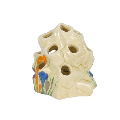 201 - A Clarice Cliff crocus pattern flower brick - painted in colours, printed facsimile signature mark t... 