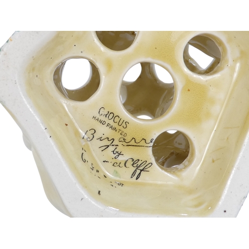 201 - A Clarice Cliff crocus pattern flower brick - painted in colours, printed facsimile signature mark t... 