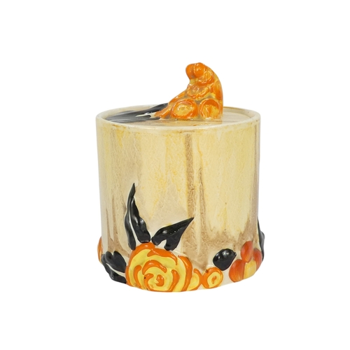 201 - A Clarice Cliff crocus pattern flower brick - painted in colours, printed facsimile signature mark t... 