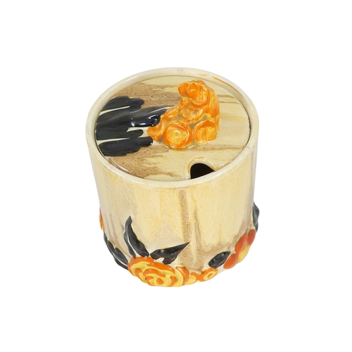 201 - A Clarice Cliff crocus pattern flower brick - painted in colours, printed facsimile signature mark t... 