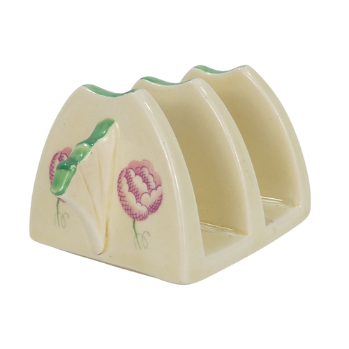 201 - A Clarice Cliff crocus pattern flower brick - painted in colours, printed facsimile signature mark t... 