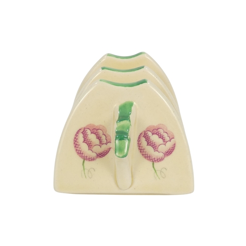 201 - A Clarice Cliff crocus pattern flower brick - painted in colours, printed facsimile signature mark t... 