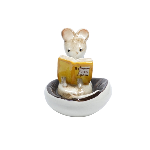 248 - Kitty MacBride for Beswick 'A Good Read' - 7cm high, together with three similar figures. (4)