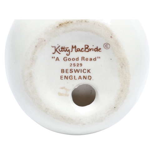 248 - Kitty MacBride for Beswick 'A Good Read' - 7cm high, together with three similar figures. (4)