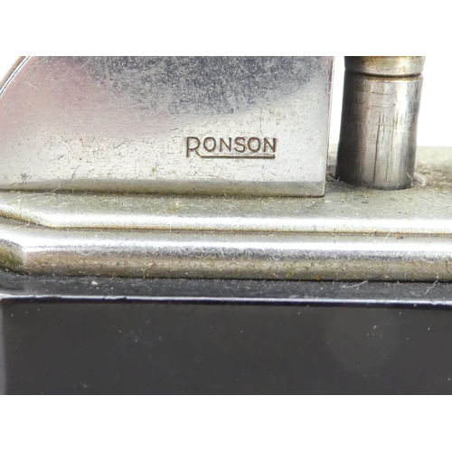 28 - A Ronson Octete touch-tip table lighter - chrome and Bakelite, rectangular with canted corners, 9cm ... 