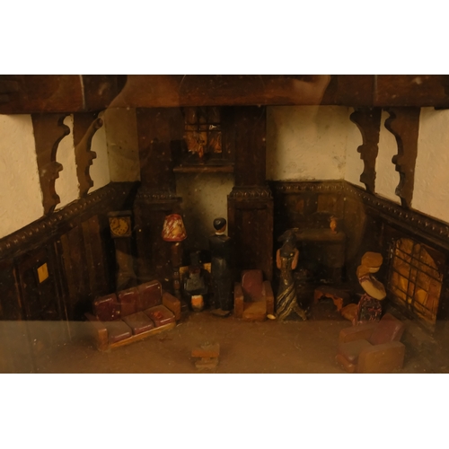 35 - A vintage illuminated diorama - showing a 1930's mock Tudor country house interior with figures, 42 ... 