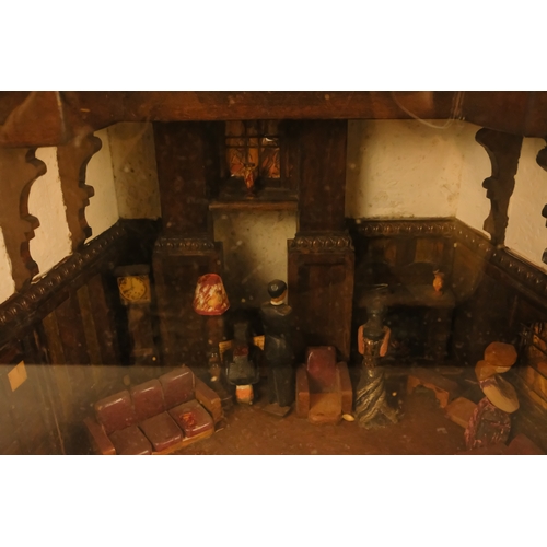 35 - A vintage illuminated diorama - showing a 1930's mock Tudor country house interior with figures, 42 ... 