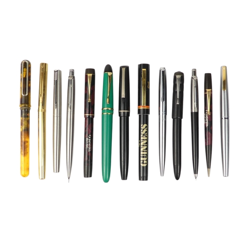 4 - A collection of writing tools - including various Parker fountain pens.