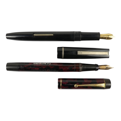 4 - A collection of writing tools - including various Parker fountain pens.