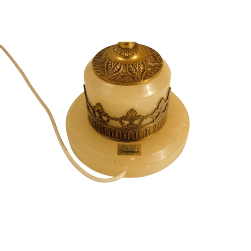 42 - A pair of alabaster and gilt metal table lamps - with twin handles and foliate castings, 58cm high. ... 