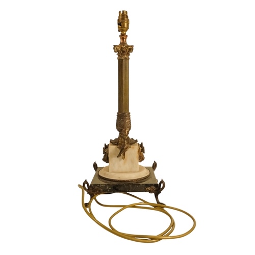 43 - A brass and marble table lamp - modelled as a Corinthian column, the square white marble base with p... 
