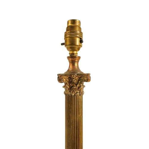 43 - A brass and marble table lamp - modelled as a Corinthian column, the square white marble base with p... 