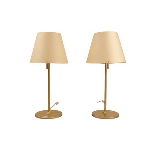 44 - Adrien Gardere (b. 1972) for Artemide, a pair of table lamps - with tilting cream shades on bronzed ... 