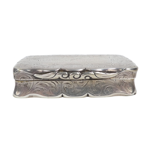 513 - A silver snuff box - Birmingham 1873, Nathanial Mills, rectangular engraved with foliage, together w... 