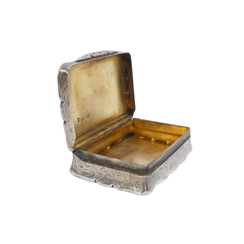 513 - A silver snuff box - Birmingham 1873, Nathanial Mills, rectangular engraved with foliage, together w... 