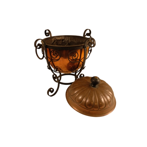 6 - A late 19th century Arts and Crafts style copper and wrought iron coal scuttle - circular with a gad... 