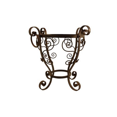 6 - A late 19th century Arts and Crafts style copper and wrought iron coal scuttle - circular with a gad... 