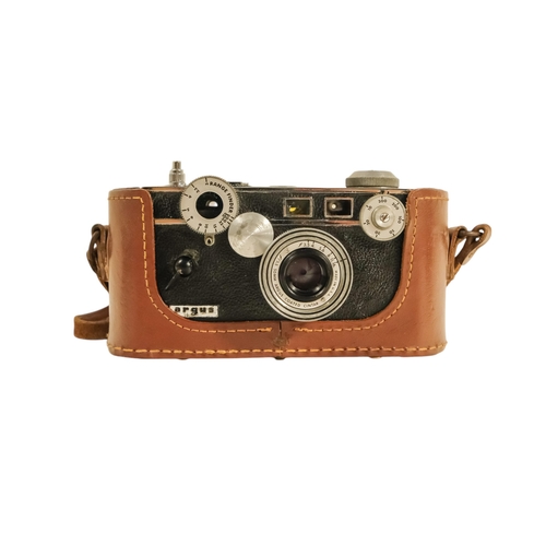 65 - An Argus Cintar 50mm camera - with a brown leather case, together with five other cameras. (6)