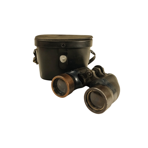 68 - A pair of late 19th century binoculars 8x30 - together with several other similar pairs.