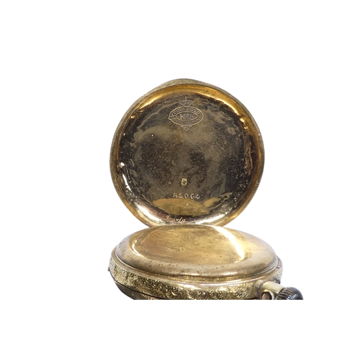 706 - An 18ct gold pocket watch - with an open face and foliate engraved, the white vitreous dial set out ... 