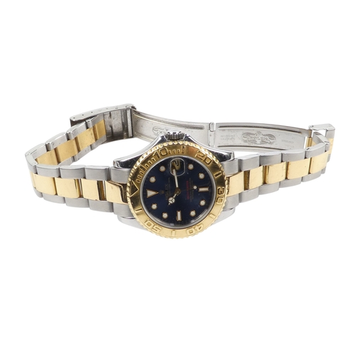 722 - Rolex Yachtmaster mid-size wristwatch - with a blue dial on a bi colour Oyster bracelet, model 16628... 