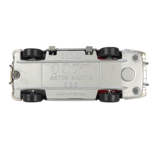 79 - A chrome aircraft desk weight - modelled as a Bristol Beaufort, 15cm long, together with two Corgi c... 