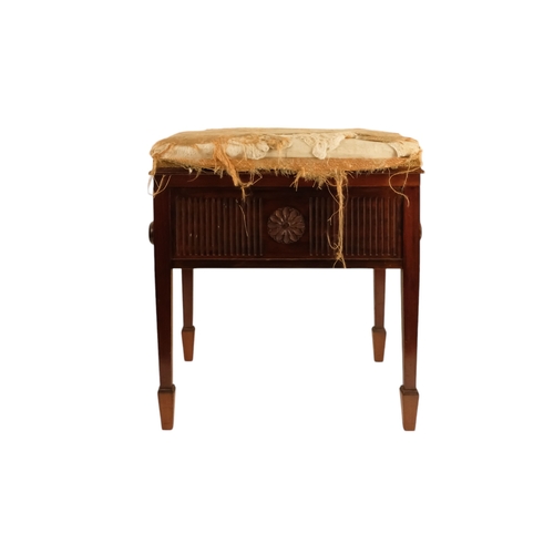 921 - An Edwardian mahogany piano stool - with an upholstered hinged seat above a fluted frieze, on square... 