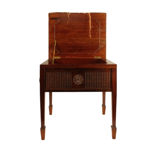 921 - An Edwardian mahogany piano stool - with an upholstered hinged seat above a fluted frieze, on square... 