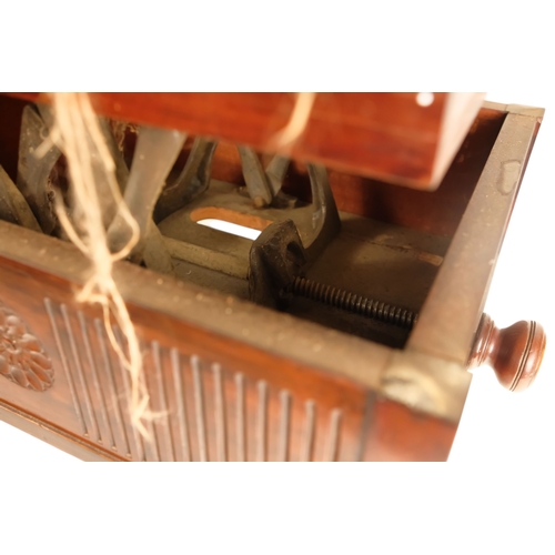 921 - An Edwardian mahogany piano stool - with an upholstered hinged seat above a fluted frieze, on square... 