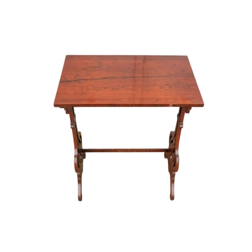 926 - A nest of three William IV rosewood tables - with rectangular tops and pierced vase shaped end suppo... 