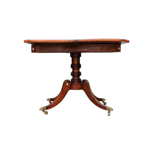 934 - A George IV rosewood card table - the rectangular top with canted corners, on a turned support and p... 