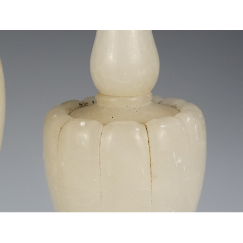 15 - A mid 20th century alabaster table lamp - of vase form raised on a square base, 38cm high, together ... 
