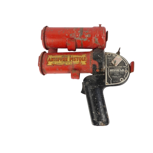 17 - A vintage Antifyre Pistole fire extinguisher - with mounting bracket and spare canister, 22cm.
