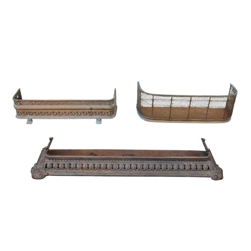 19 - A Victorian cast iron fire curb - decorated with pierced foliage, together with two further fire cur... 