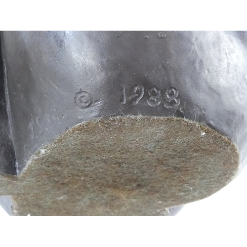 22 - A 20th century cold cast bronze of a seated nude - hunched, signed with initials and dated, 19cm hig... 