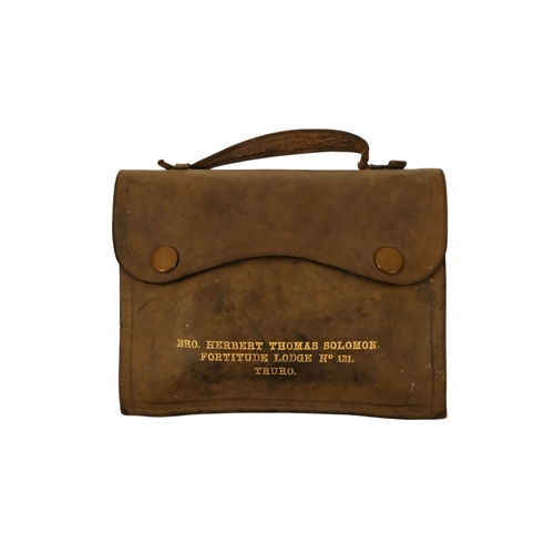 27 - A masonic apron - together with silver and enamel jewel, presented with brown leather pouch.