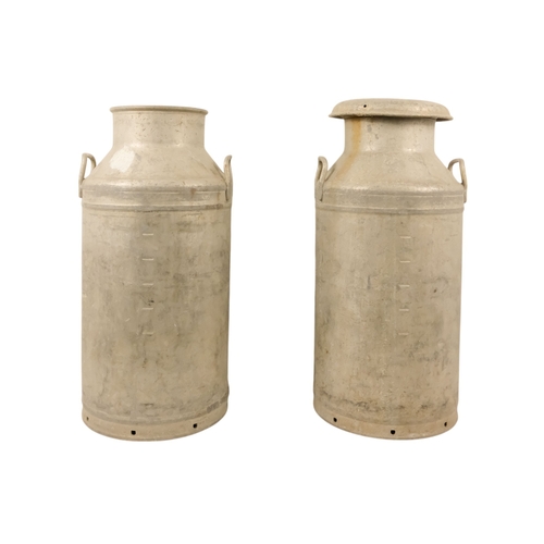 28 - An aluminium ten gallon milk churn - Milk Marketing Board, with lid, 75cm high, together with anothe... 