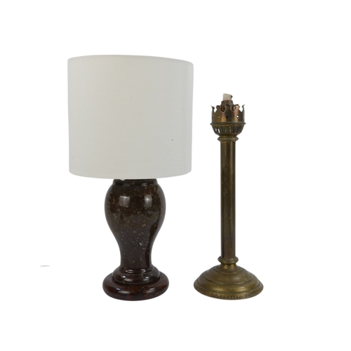 31 - A 20th century turned serpentine table lamp - of baluster form and with circular base, 22cm high, to... 