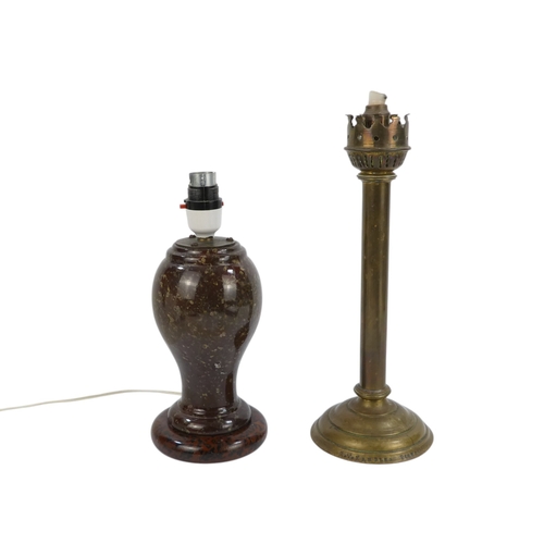 31 - A 20th century turned serpentine table lamp - of baluster form and with circular base, 22cm high, to... 