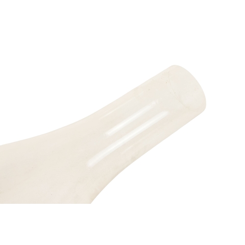 40 - A late Victorian oil lamp - with a flash-cut clear glass reservoir on a repousse brass support and c... 