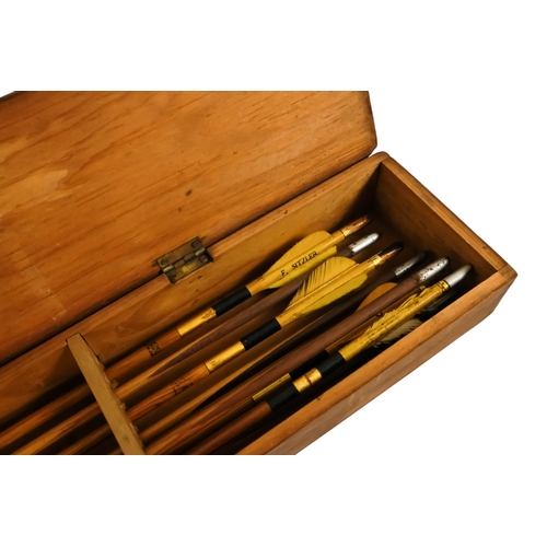44 - A boxed set of eight archery arrows by F H Ayres - together with a quantity of sundry associated equ... 
