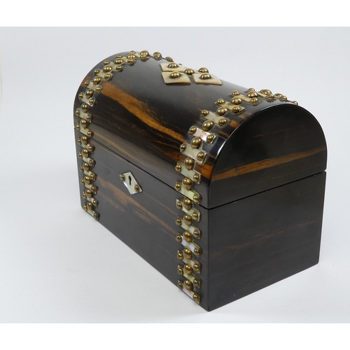 49 - A late Victorian coromandel stationery casket - with a domed cover and set with brass studs and moth... 