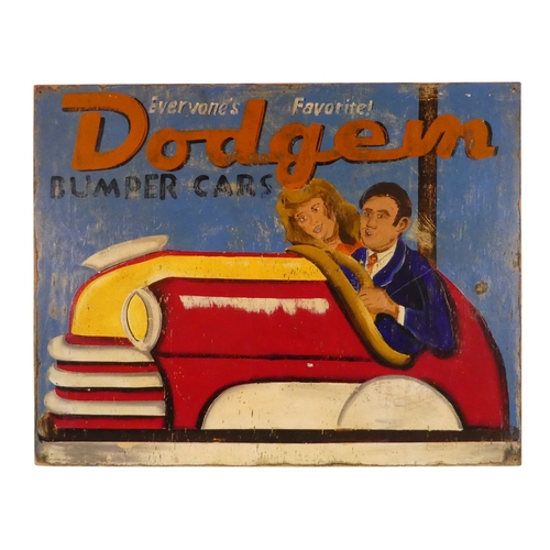 56 - A painted showmans sign - 'Bumping Cars', distressed decoration with a couple in a car and inscribed... 